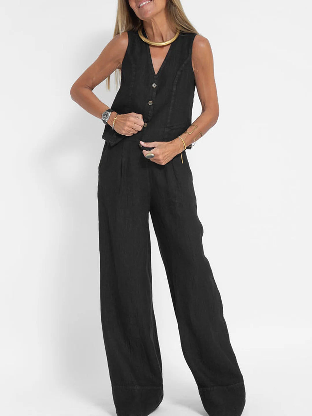 Aira – Set med knäppt väst & vida byxor