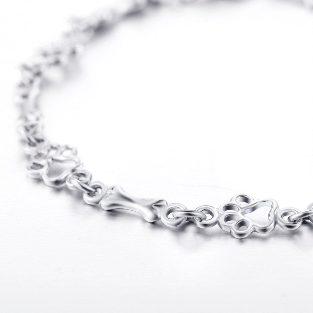 Liora™ | Armband med tass- och benberlocker