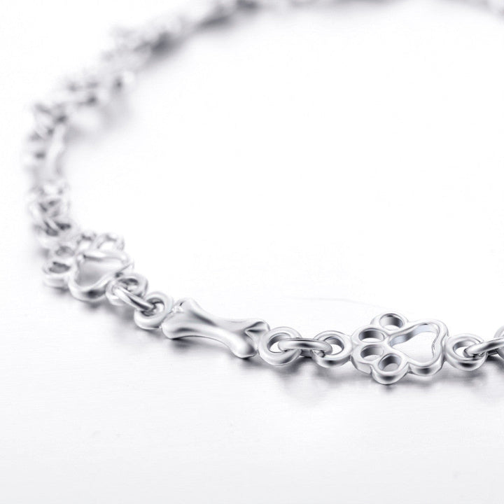 Liora™ | Armband med tass- och benberlocker