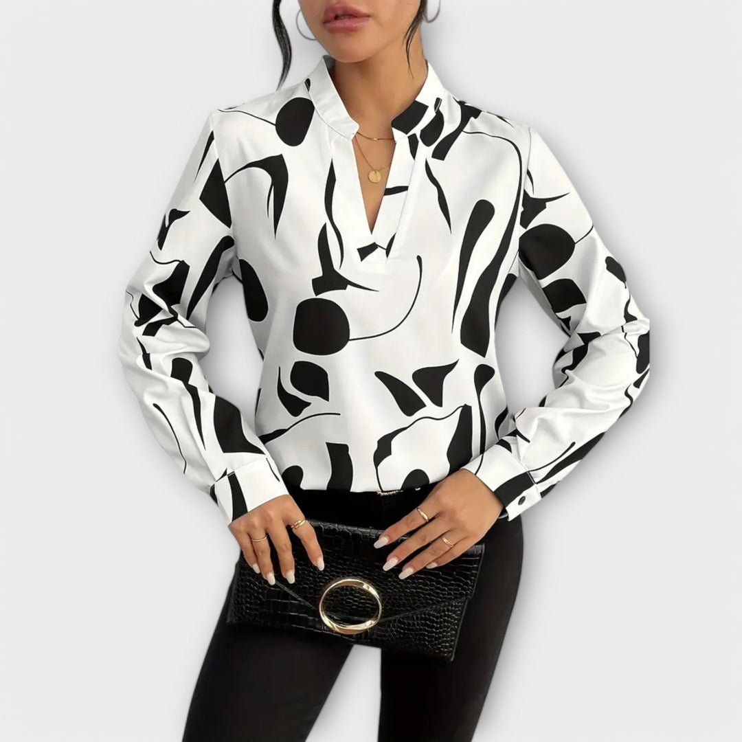 Lara™ Elegant Blus Med Design